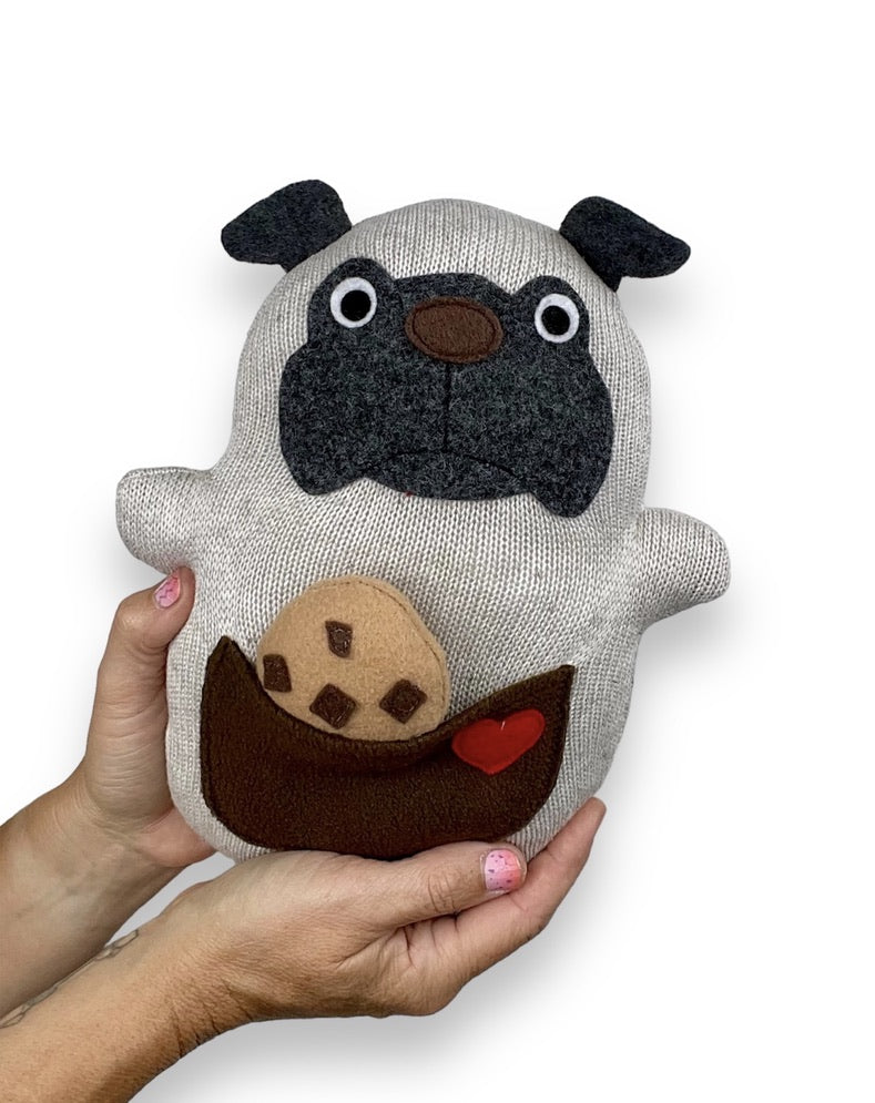 Pug stuffed animal, handmade from up cycled fabrics. pocket on belly with a felt cookie inside