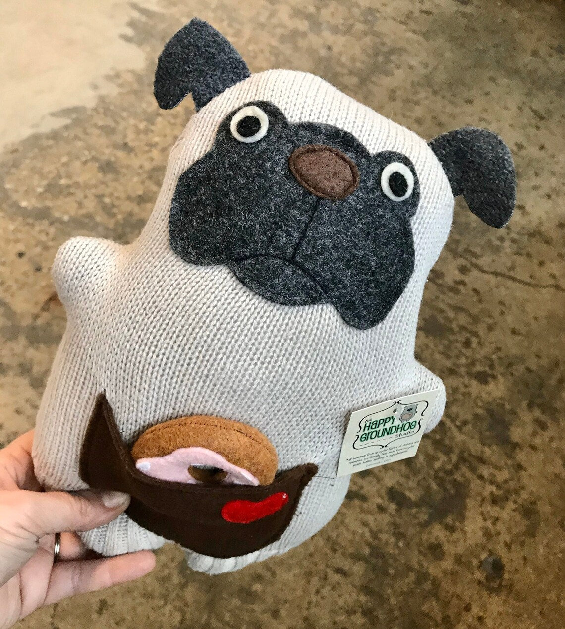 Pug stuffed animal, handmade from up cycled fabrics. pocket on belly with a felt donut inside