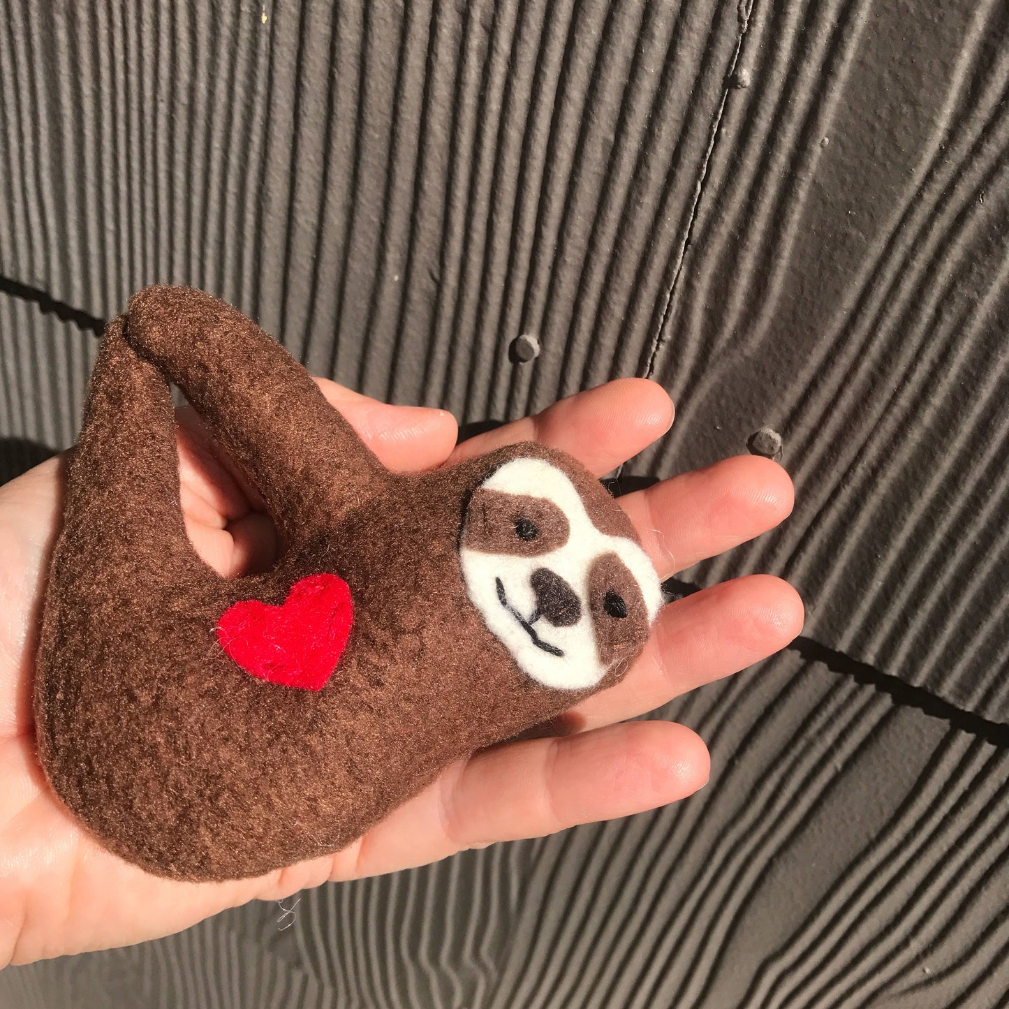 Sloth ornament handmade from recycled fabrics