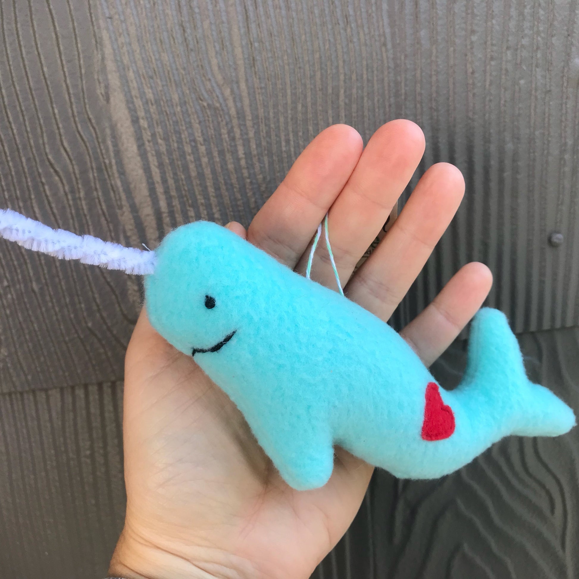 Narwhal ornament handmade from recycled materials