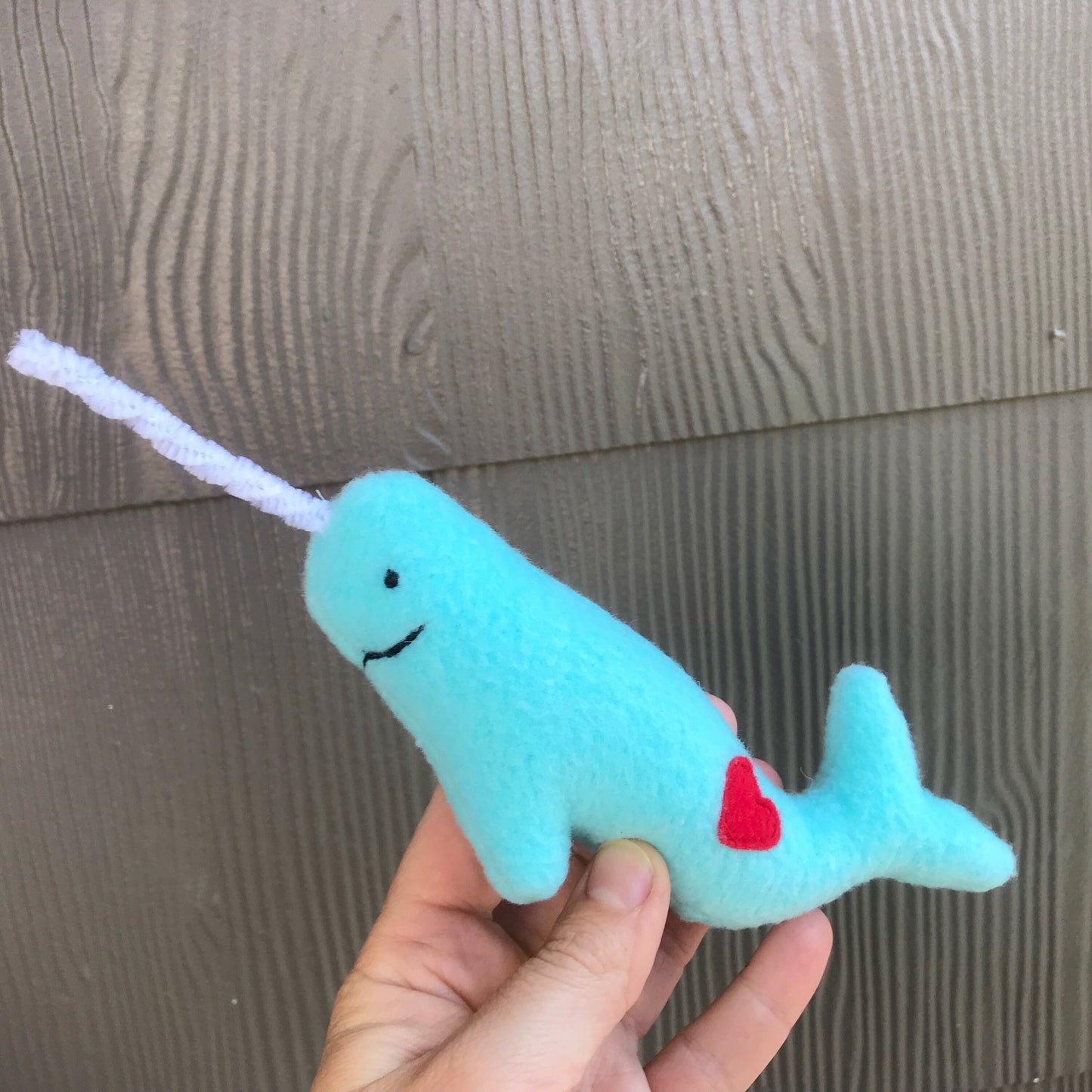 Narwhal ornament handmade from recycled materials